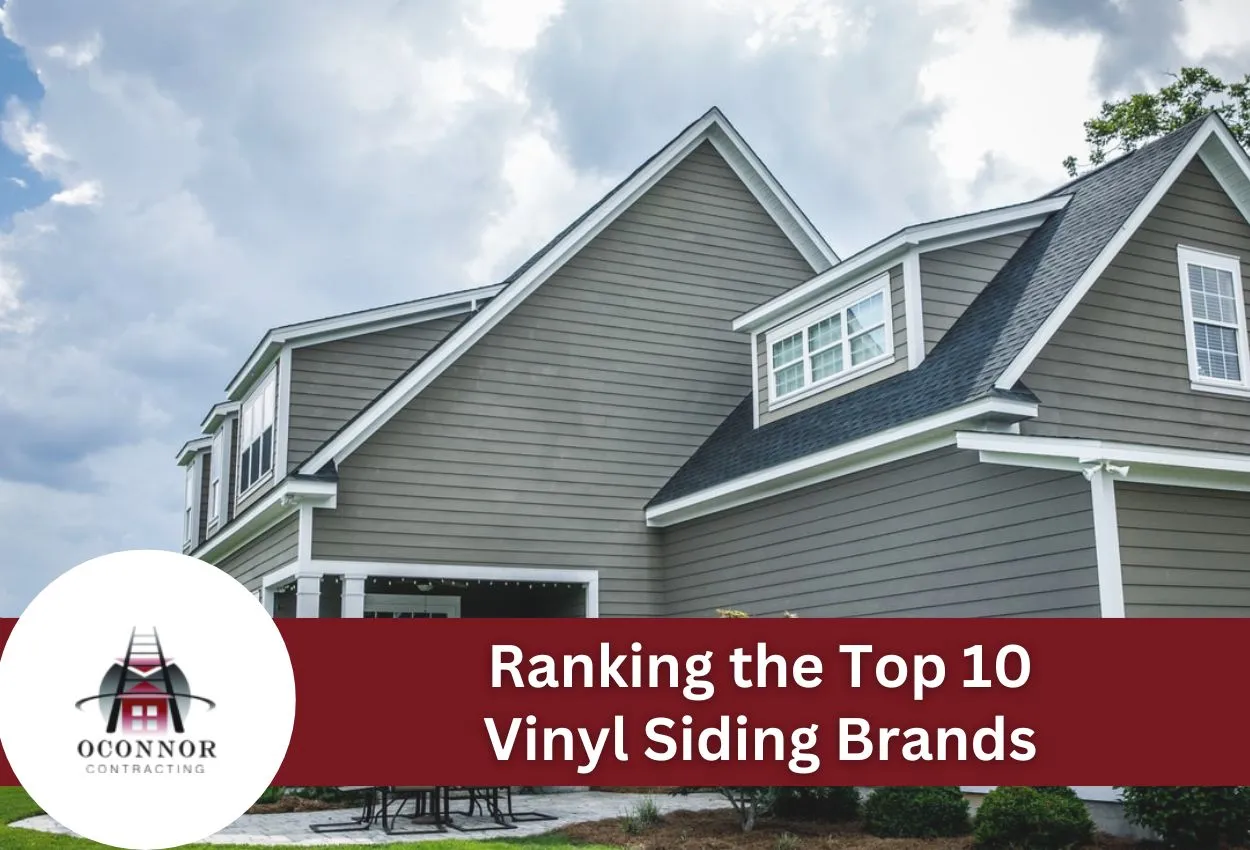 Modern home with gray vinyl siding and white trim showcasing top vinyl brands