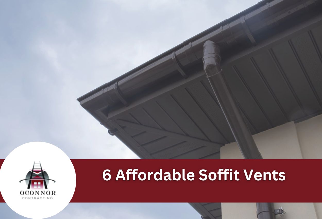House roof with soffit vents and gutters under cloudy sky
