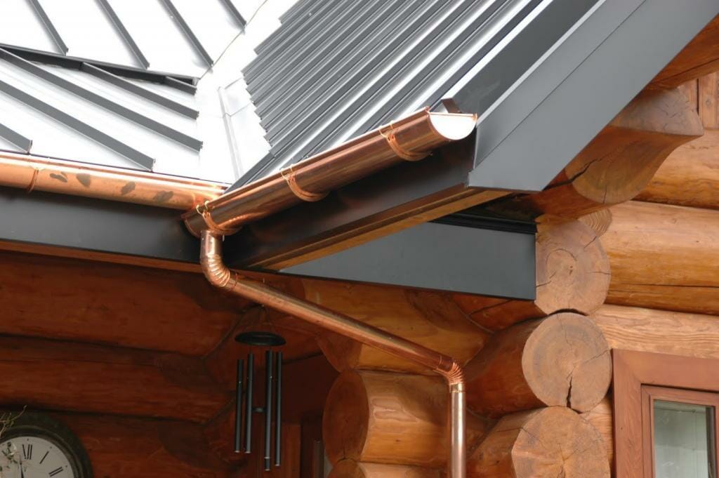 Should Gutters Match Your Roof or Trim? A Style Guide & Image Gallery 2 copper gutter