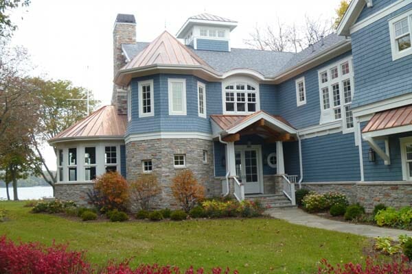 What Color Siding Goes With a Copper Roof? A Style Guide and Image Gallery 3 Copper Roof With Blue Siding