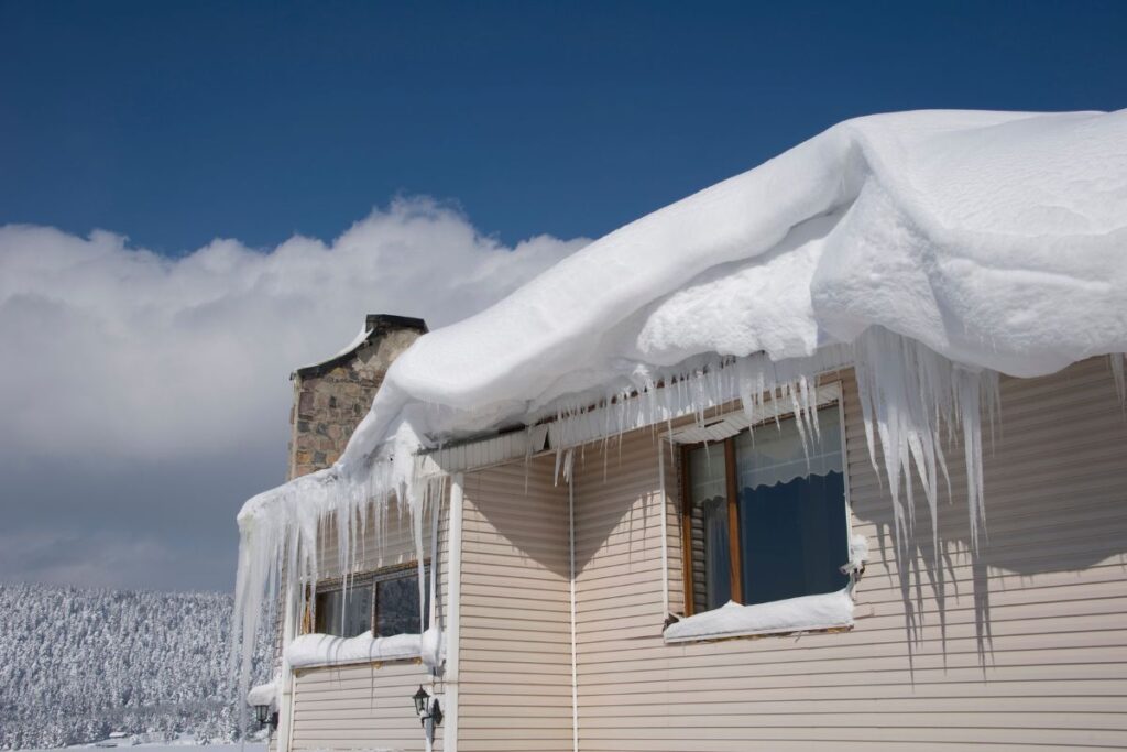 Do Metal Roofs Need Ventilation in WNY? 1 Ice Dams on roof